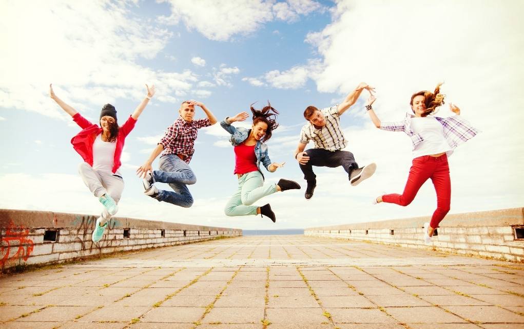 funny jumping group pose