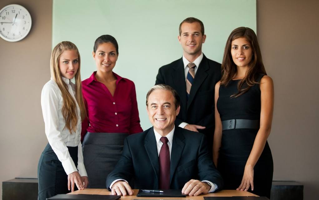 A diverse group of business people poses for a professional team photo,  exuding confidence and professionalism, AI Generative 30762181 Stock Photo  at Vecteezy